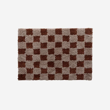 Vintage deurmat met dambord patroon