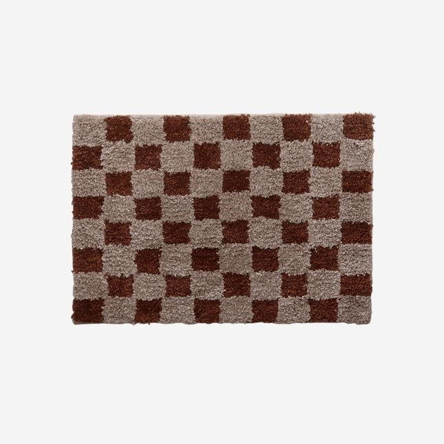 Vintage deurmat met dambord patroon