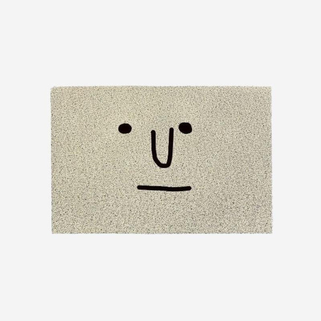 Originele grijze deurmat met gezicht