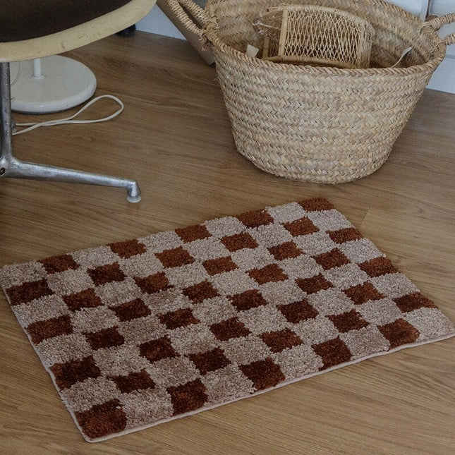 Vintage deurmat met dambord patroon