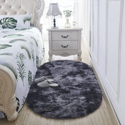 Donkergrijze ovale bedmat shaggy en zacht