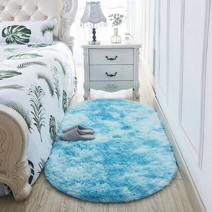 Zachte blauwe ovale shaggy bedmat
