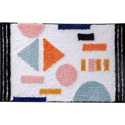 Witte absorberende badmat met vormen