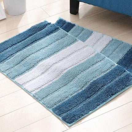 Blauw en wit gestreepte badmat