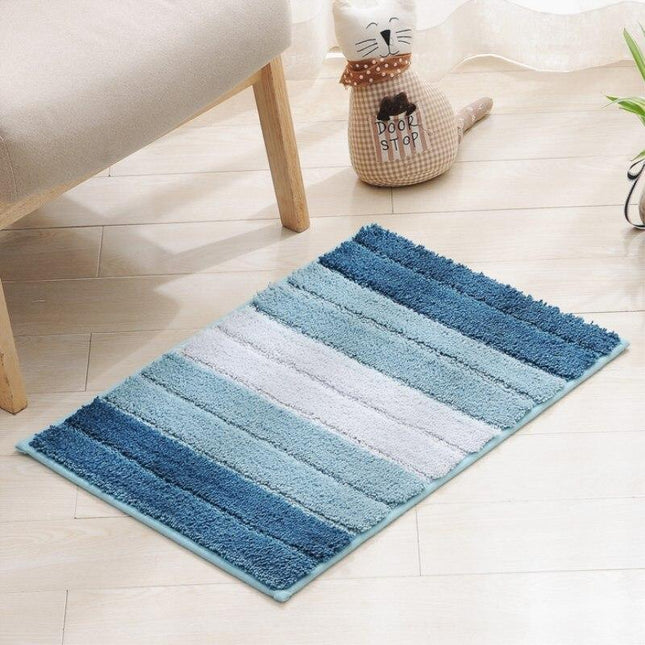 Blauw en wit gestreepte badmat
