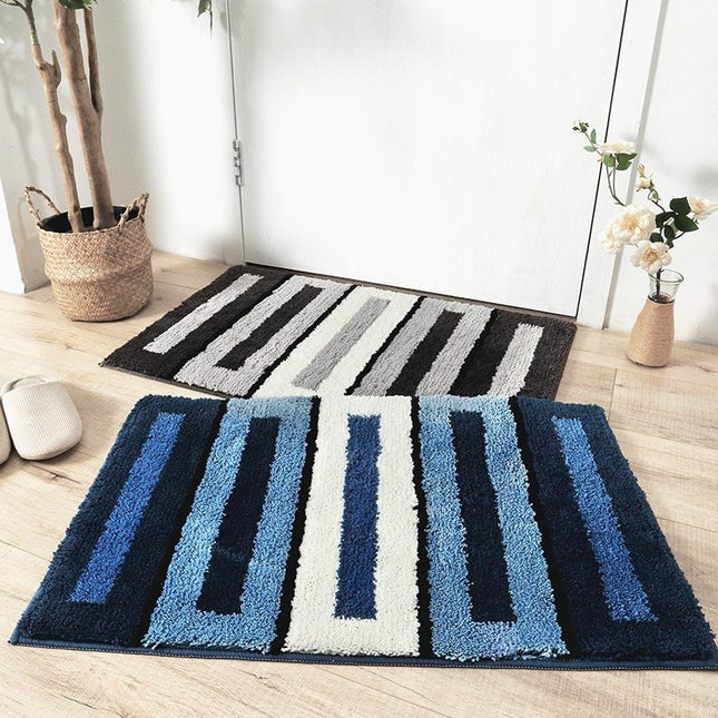 Blauw en witte badmat met strepen