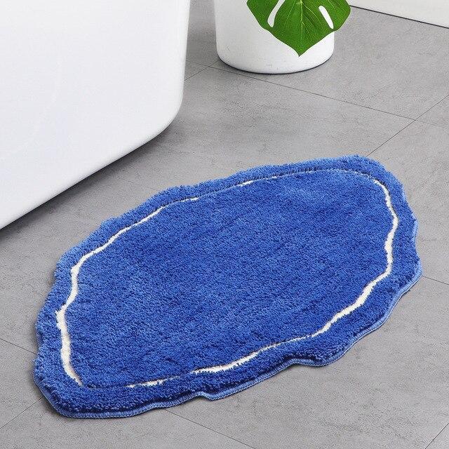 Originele blauwe badmat met sierrand