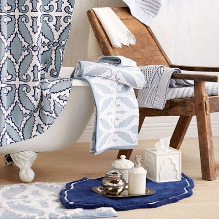 Originele blauwe badmat met sierrand