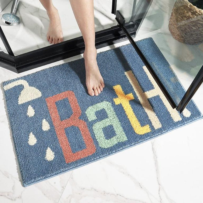 Koningsblauwe badmat met tekst 'Bath'