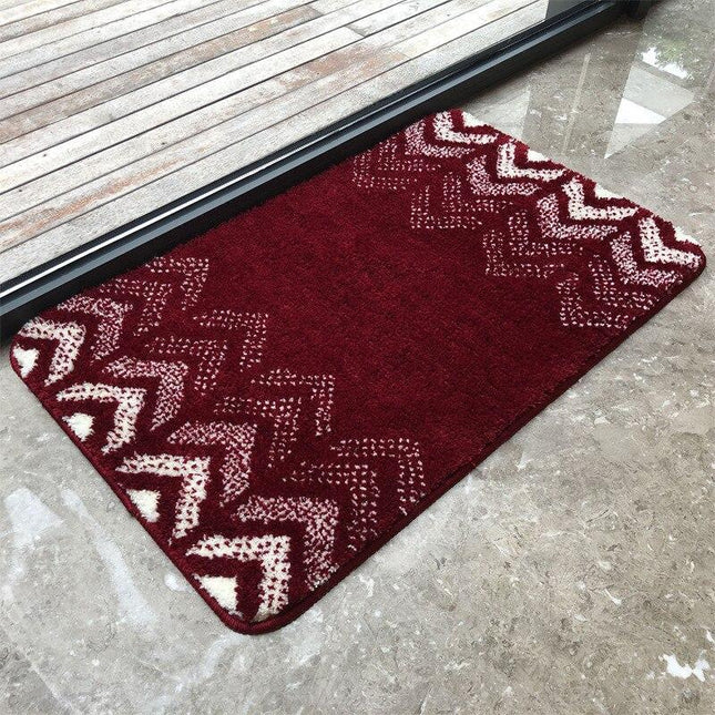 Bordeauxrode badmat met geometrisch patroon