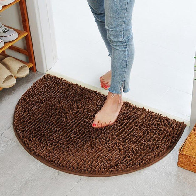 Bruine badmat in halve maan vorm