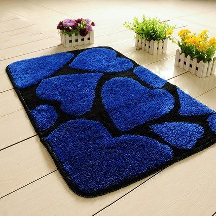 Zwart en blauwe badmat met hartjes