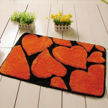 Oranje design badmat met hartjes patroon