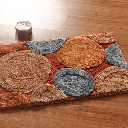 Bruine badmat met ronde stenen design