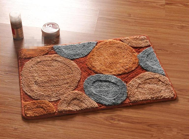 Bruine badmat met ronde stenen design