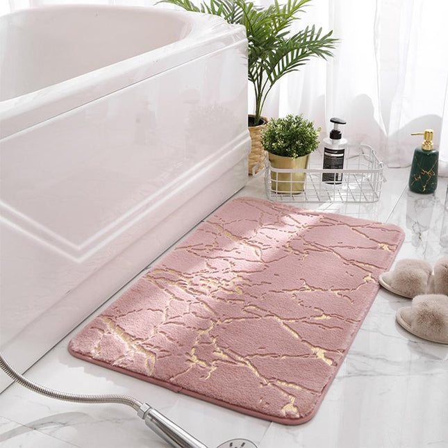 Lichtroze badmat met gouden marmerlook