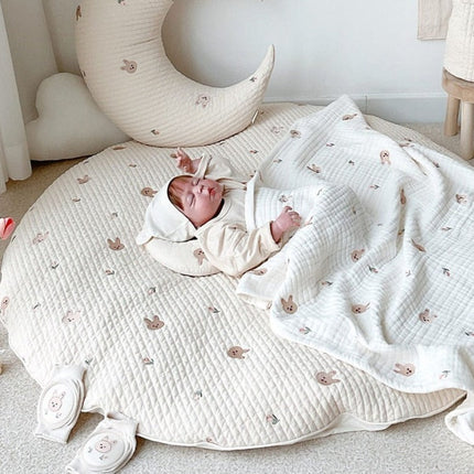 Rond gewatteerd speelkleed voor babykamer