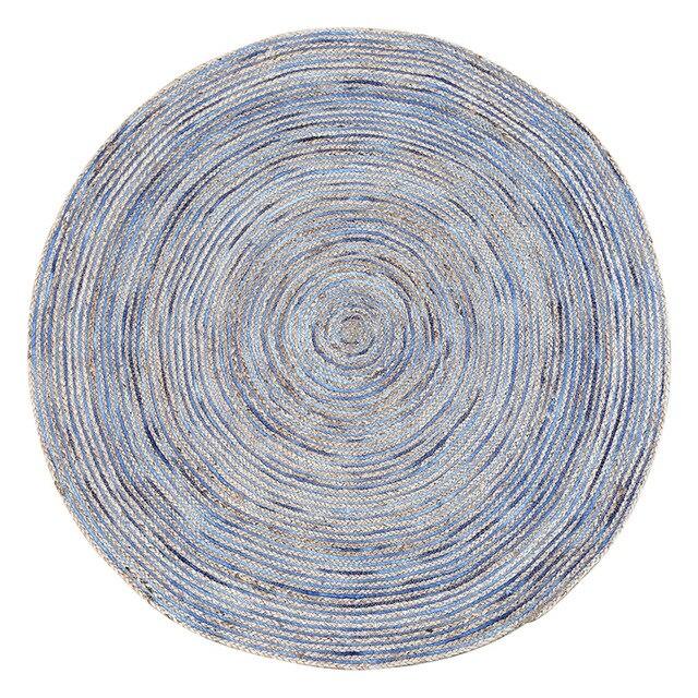 Rond blauw vloerkleed van jute