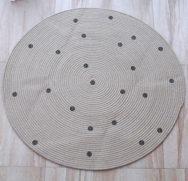 Rond jute vloerkleed met stippen
