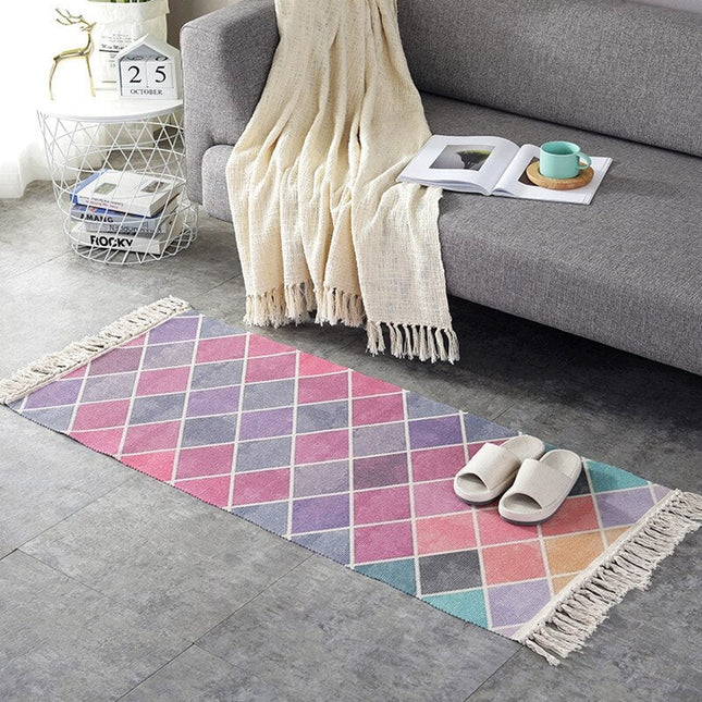 Roze vloerkleed met ruitpatroon