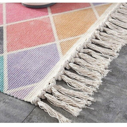 Roze vloerkleed met ruitpatroon