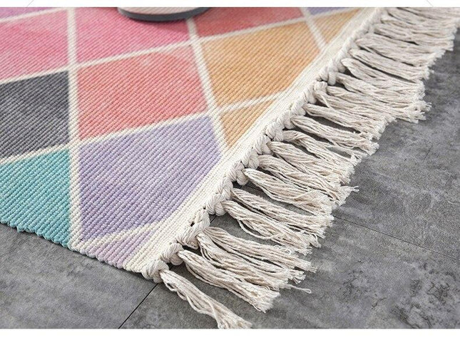 Roze vloerkleed met ruitpatroon