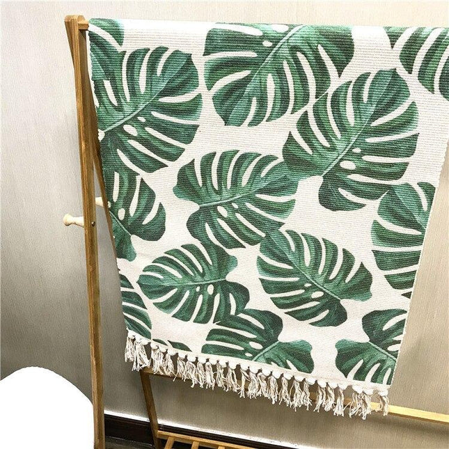 Vloerkleed met tropisch bladeren motief