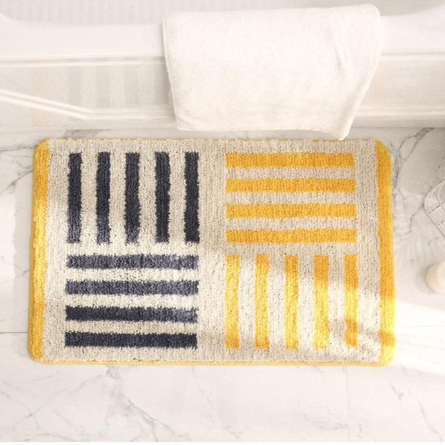 Zachte gele badkamermat met strepen